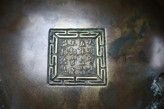 A Chinese bronze tripod censer